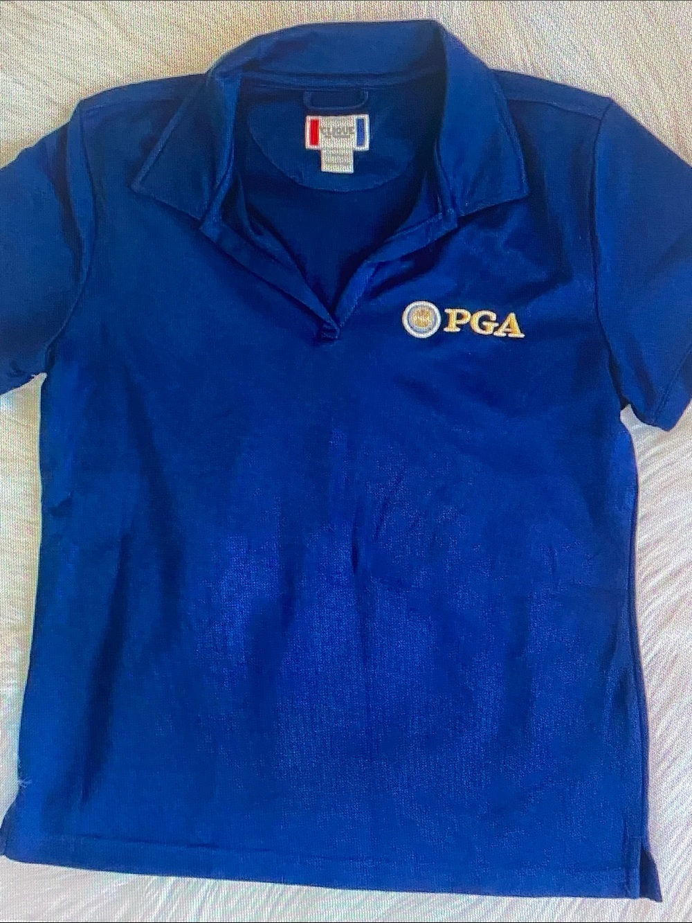 PGA Tour Royal Blue Women's Polo with Gold Embroidered Logo